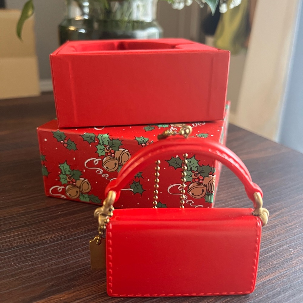 Coach limited Christmas red tabby charm